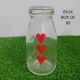 Glass Mini Milk Bottle - BOX OF 60 - red hearts